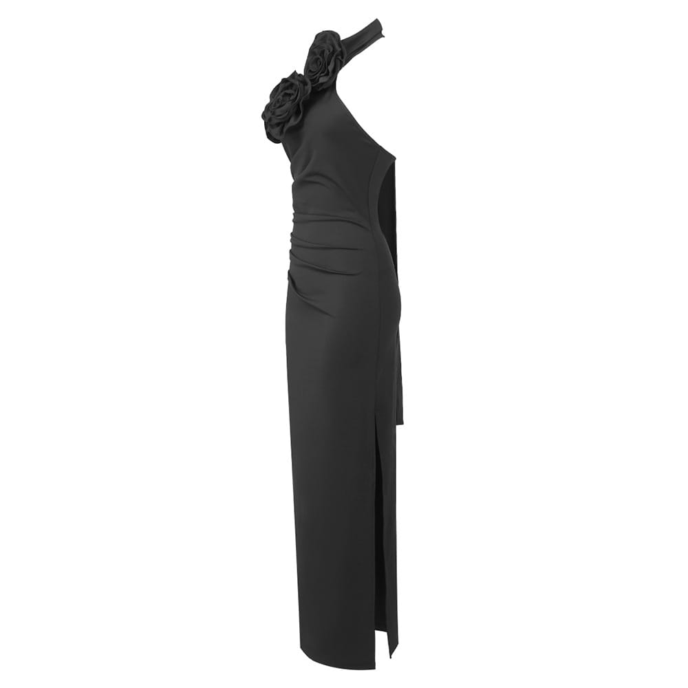 black one-shoulder evening gown with sculpted white ribbon flower embellishment at the shoulder and high slit, featuring a ribbon flower halter style.