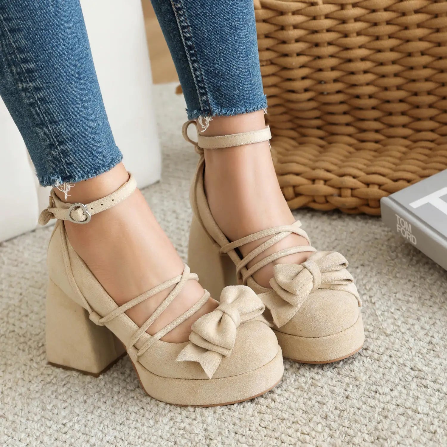 beige suede platform lolita heels with ankle straps and a decorative small size bow