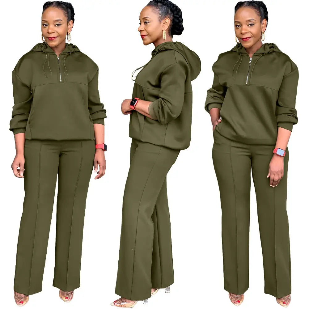 olive green solid color loose hooded sweatsuit consisting of a hooded sweatshirt and matching wide-leg pants designed for comfort and casual wear