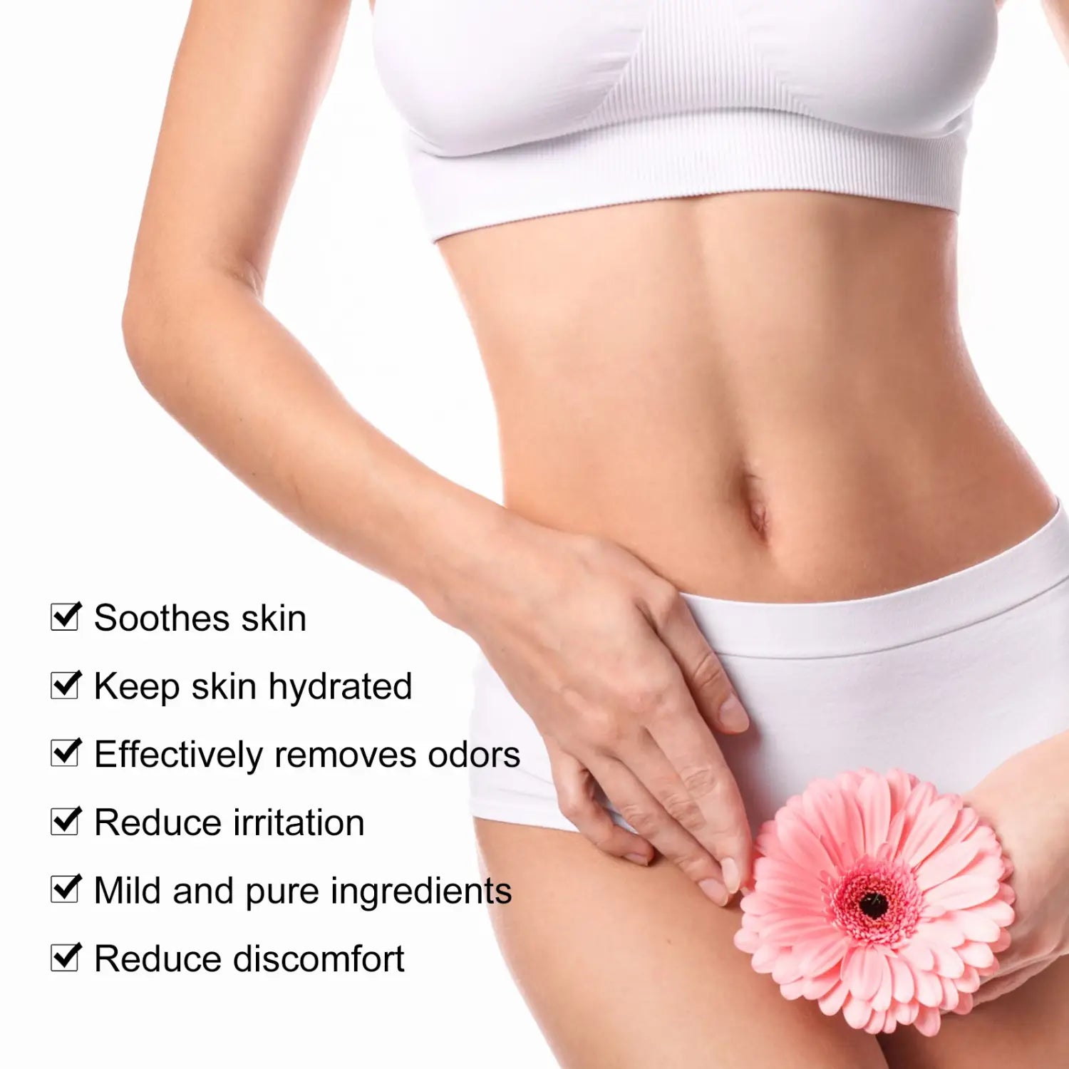 A pink gerbera daisy held in hand alongside rose soap that bath cleanses odors and relieves physical discomfort.