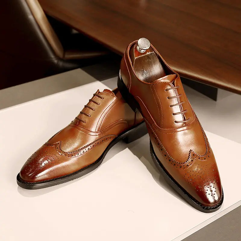 Brown leather brogue dress shoes with polished finish and decorative perforations featured as men’s black leather shoes with rubber sole brogues.