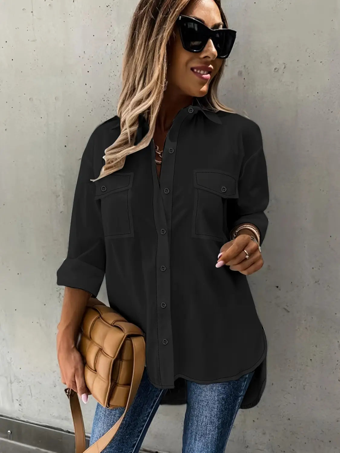black long sleeve button-up shirt with two chest pockets and rolled sleeves designed as a loose long sleeve lapel style product