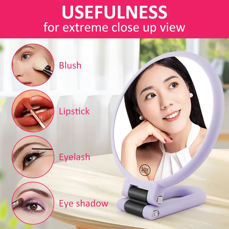 A lavender-colored foldable handle mirror purple with 10x magnification for detailed personal grooming.