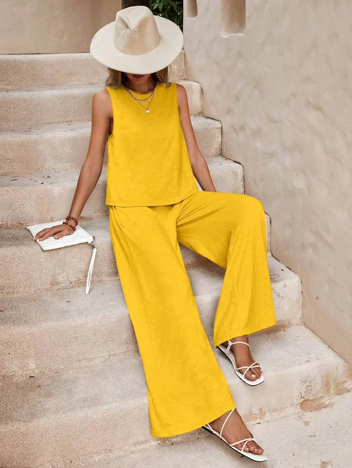 bright yellow sleeveless top and matching casual loose pants set suitable for comfortable everyday wear
