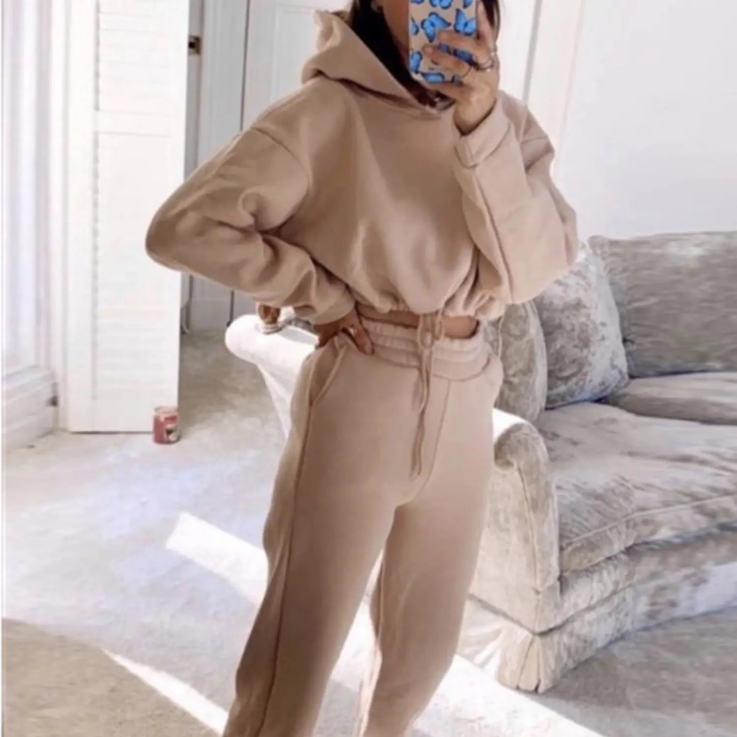 beige cropped hoodie and matching high-waisted joggers set from pink piece sweatsuits tracksuits sexy collection featuring comfortable fabric and stylish design.