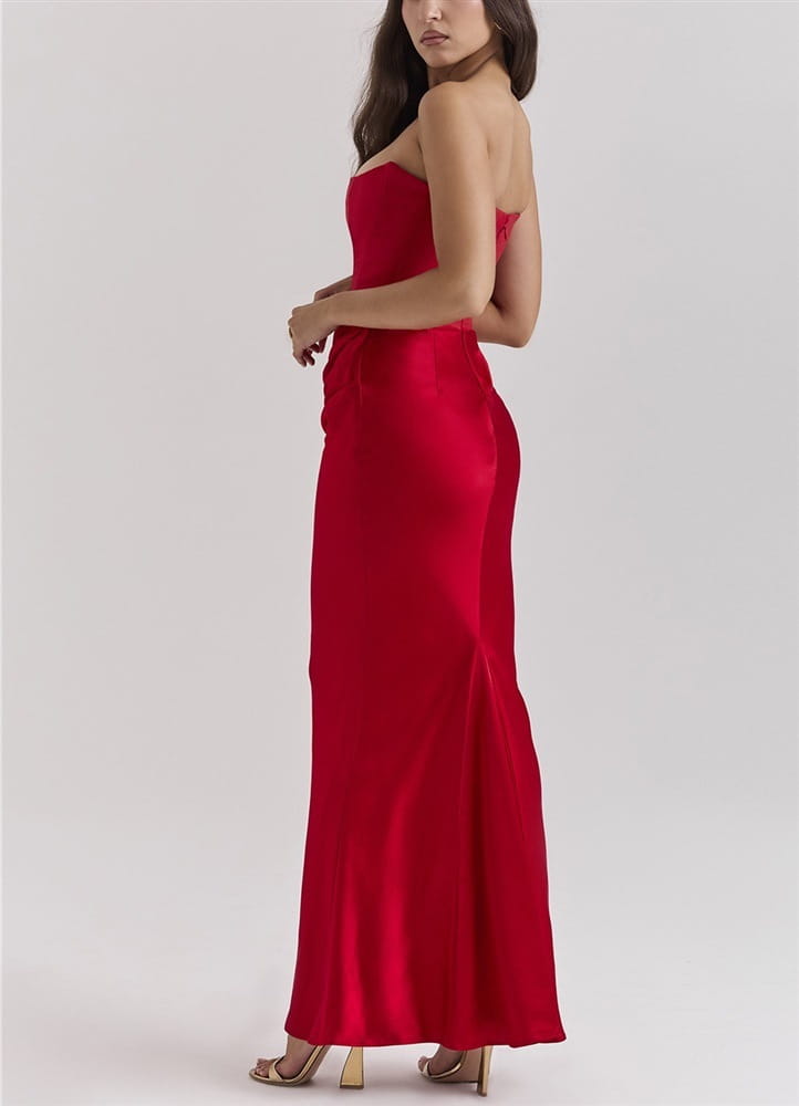 A vibrant red satin long dress sexy fashion bandeau mermaid gown with a fitted silhouette and flowing skirt.