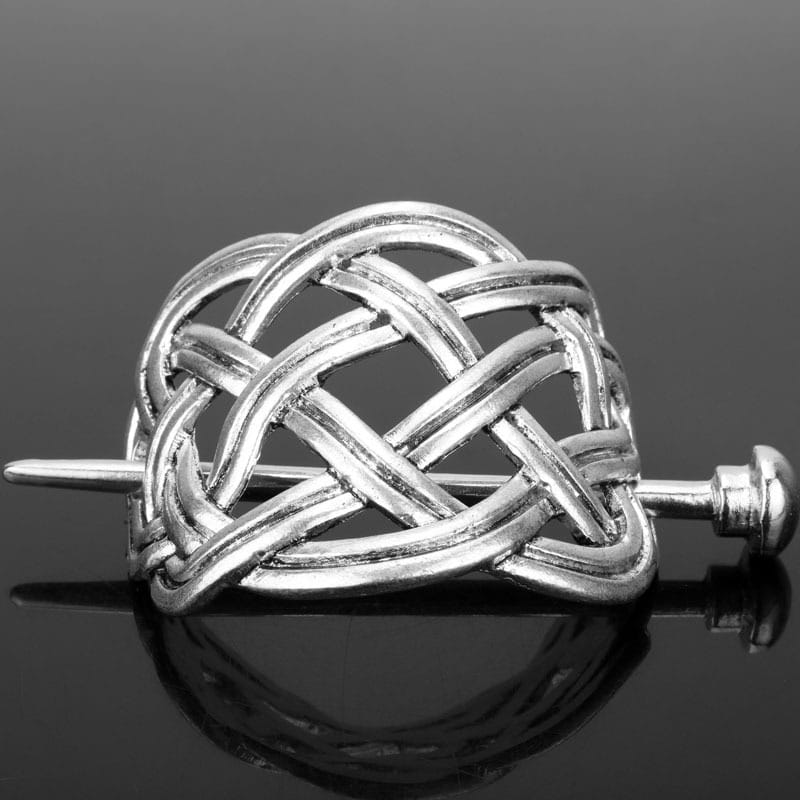 Silver celtic knot metal hair clip featuring an intricate woven knot design in silver-toned metal hair clip perfect for a retro hair accessory.