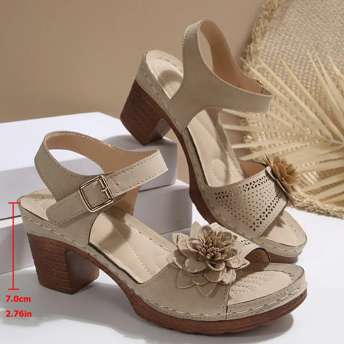 beige suede chunky heel sandals with floral embellishments and a wooden block heel ideal as heel sandals summer footwear