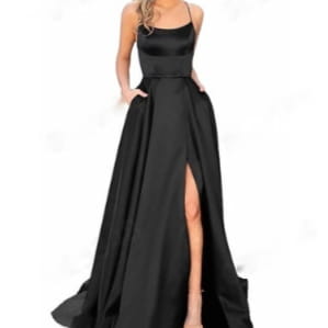 black satin solid color long slimming evening gown with a high slit and thin spaghetti straps perfect for formal occasions