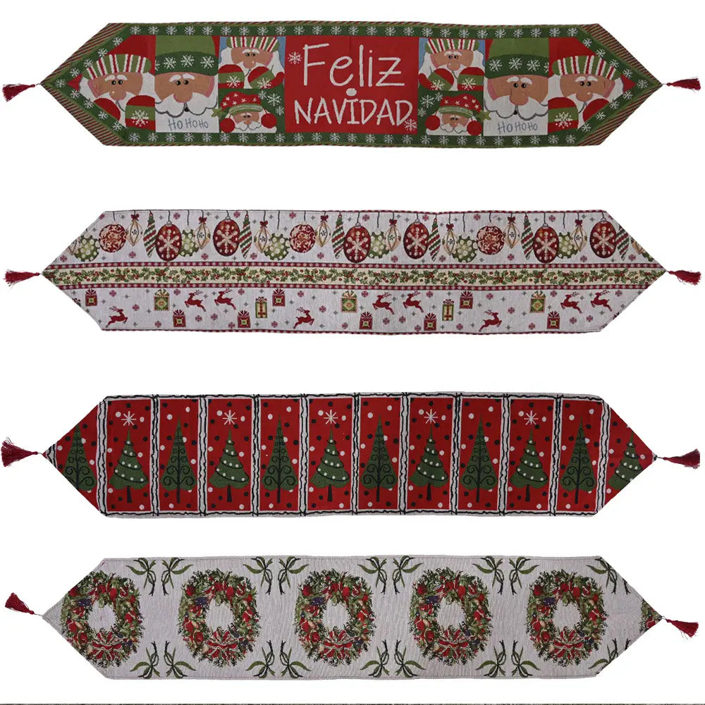 Four woven christmas table runners with tassels in red green and white featuring unique festive patterns for a christmas table setting.