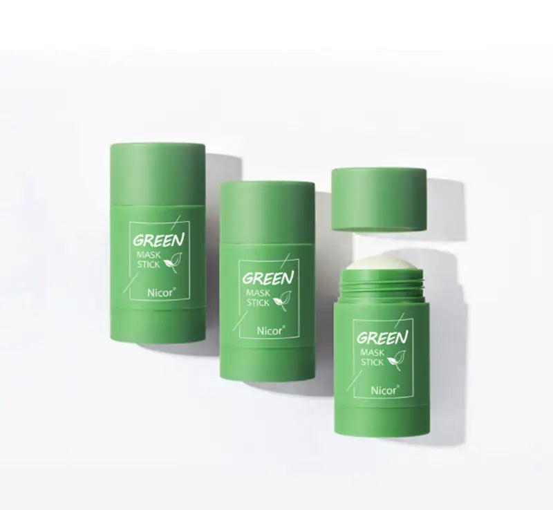 green cylindrical nicor mask stick with matte finish and white labeling for oil control cleansing green tea and eggplant skincare.