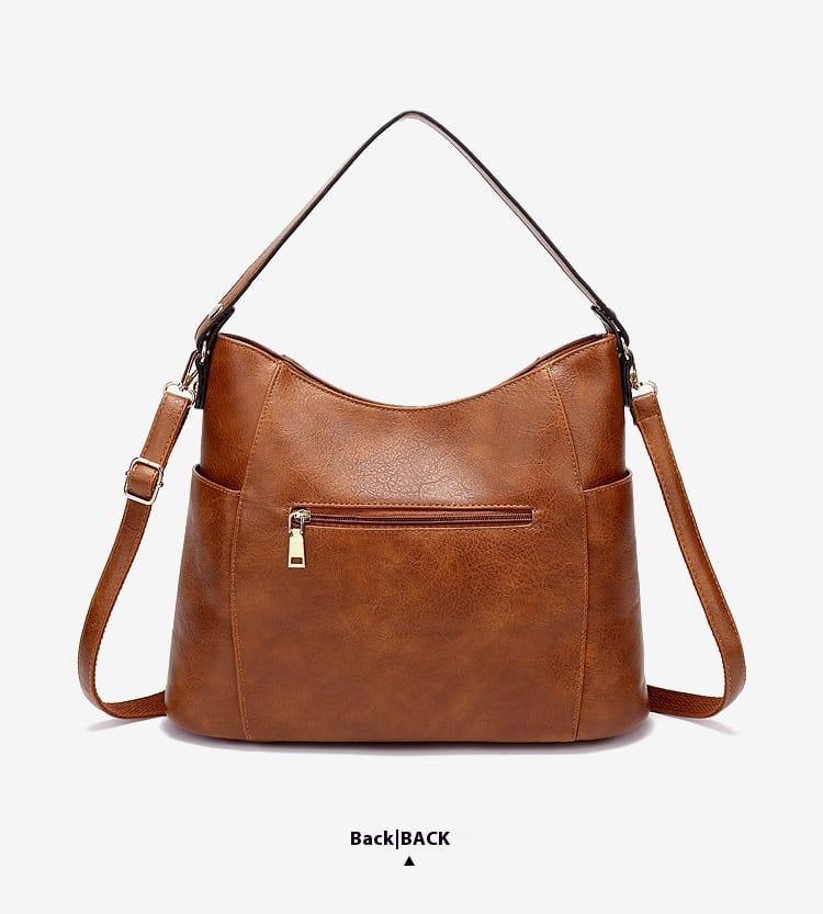 Brown faux leather luxury women leather hobo bag with large capacity, single shoulder strap, and front zip pocket.