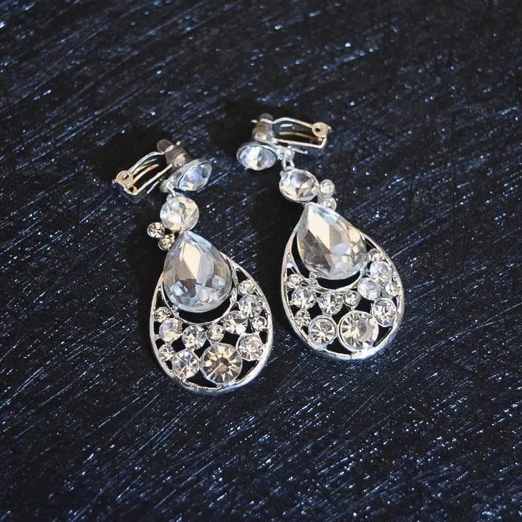 silver teardrop earrings with clear crystals and delicate openwork design from a crystal bridal headdress flowers jewelry set suitable for flowers wedding hair and headdress flowers wedding styles