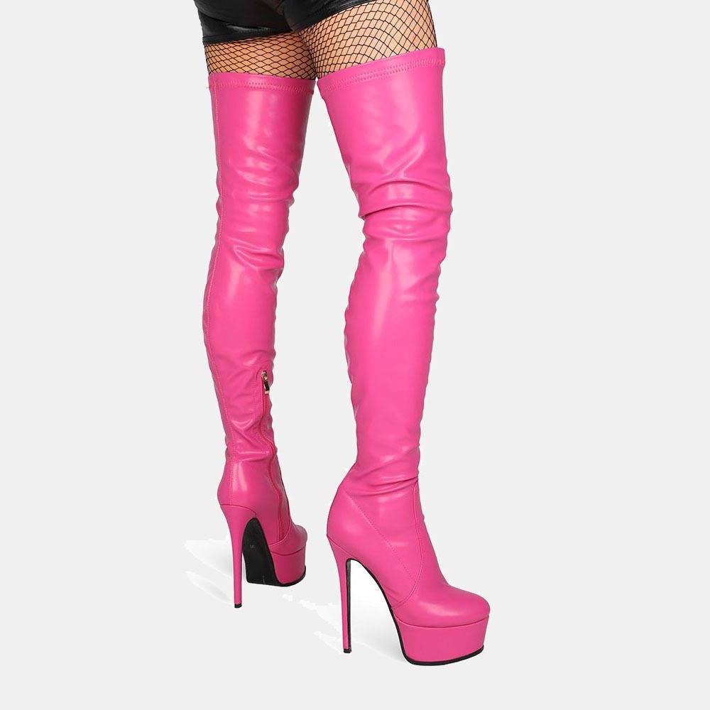 Vibrant pink patent leather knee high high heel boots with glossy finish, platform soles, and stiletto heels.