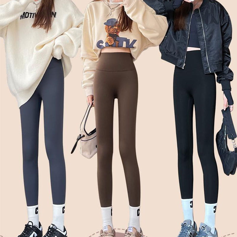 three pairs of fleece thickened winter shark pants high waist leggings in navy blue brown and black are modeled with casual tops highlighting their form-fitting design and warm material.