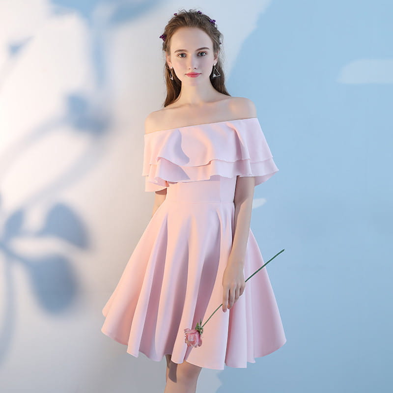 A pink short sisters off shoulder ruffled dress made from soft main fabric with layered ruffles and a flared skirt.
