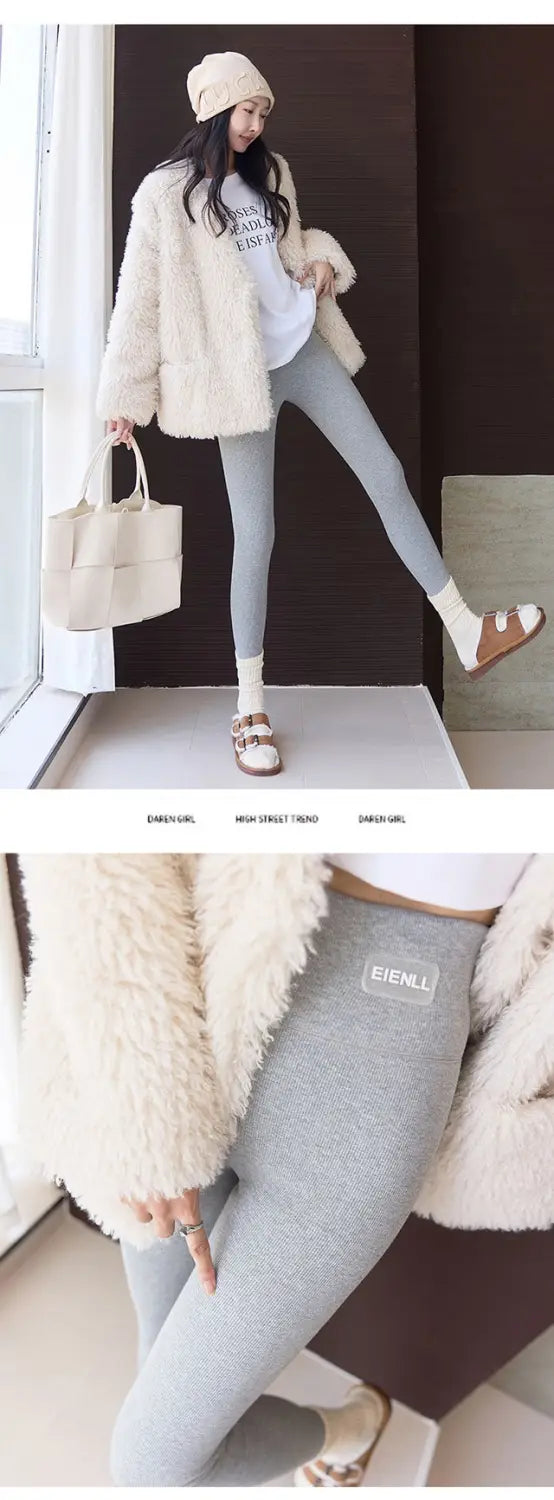 gray textured winter threaded underwear leggings with a small white embroidered brand logo on the upper thigh and a high waist high elastic threaded design