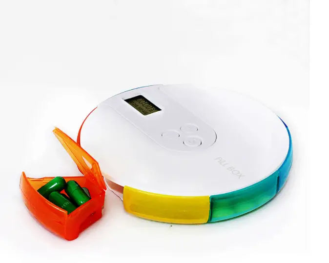 7 compartment white and blue alarm clock pill dispenser with rainbow-colored circular segmented compartments and a digital display for organized medication storage.