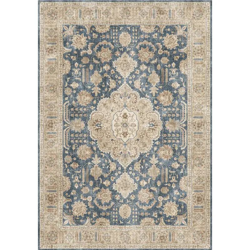 A vintage-inspired burgundy ornate short pile area rug features a deep navy blue field with intricate cream-colored floral patterns and detailed border designs.