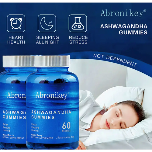 Blue glass bottles of abronikey ashwagandha vitamin d gummies with white caps and mixed berry dietary supplement labels