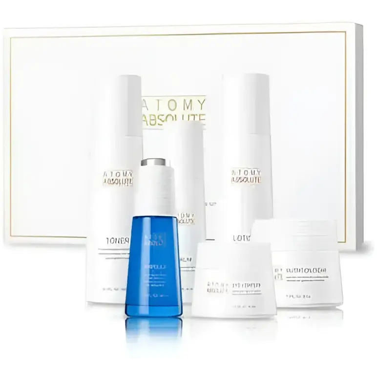 The blue glass absolute skincare set toner ampoule serum bottle features a silver cap and white label with green tea essential