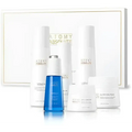 The absolute skincare set blue glass toner ampoule serum bottle with silver cap and green tea essential label
