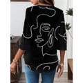 Black casual office blouse with abstract face pattern and three-quarter sleeve length featuring white line art design