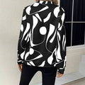 Black and white abstract printed notched collar shirt long sleeve with modern flowing design for stylish wear