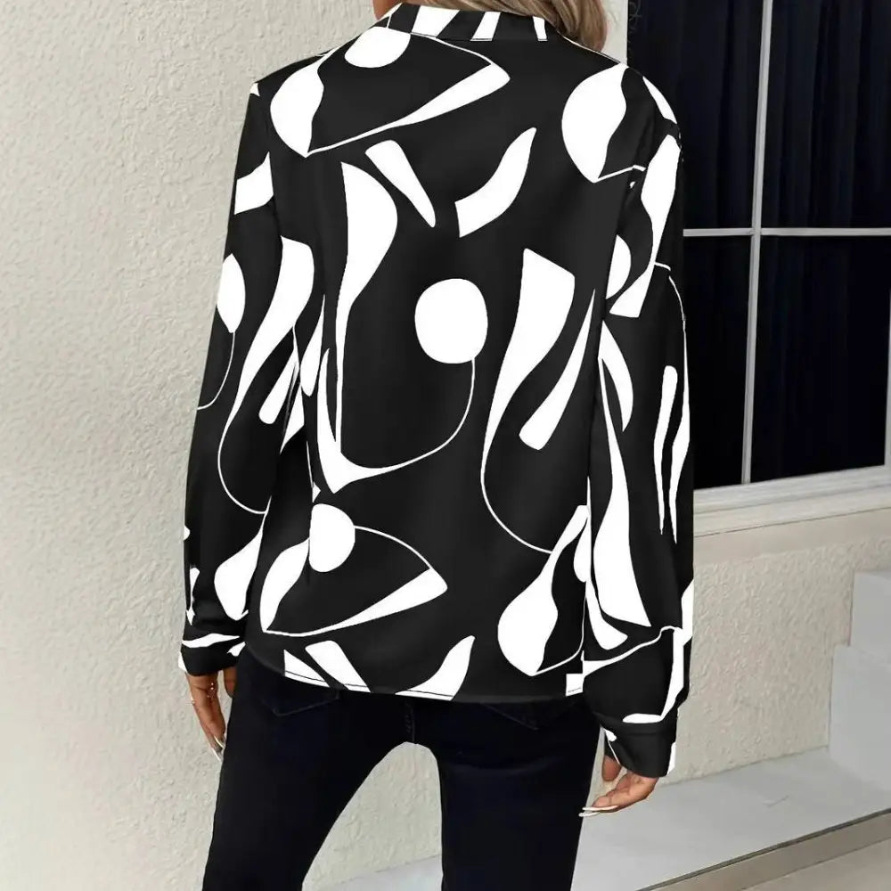Black and white abstract printed notched collar shirt long sleeve with modern flowing design for stylish wear