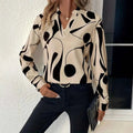 Beige and black abstract printed notched collar shirt long sleeve blouse with v-neckline for stylish wear