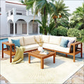 Beige outdoor sectional sofa set with acacia wood frame and woven mesh sides paired with matching coffee table