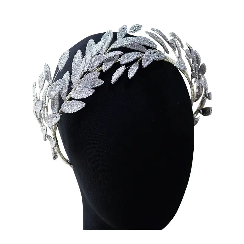 Silver leaf zircon alloy hair band with intricate leaf pattern adorned with sparkling artificial zircon alloy crystals.