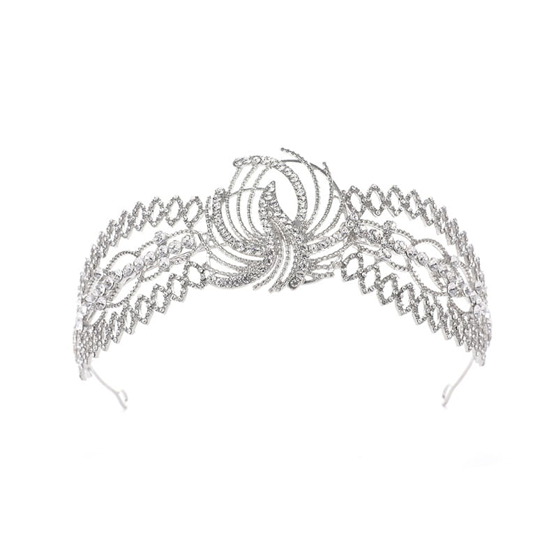 Silver rhinestone crown luxury featuring an intricate swirling design and delicate metal framework, perfect as a bridal luxury clothing accessory.