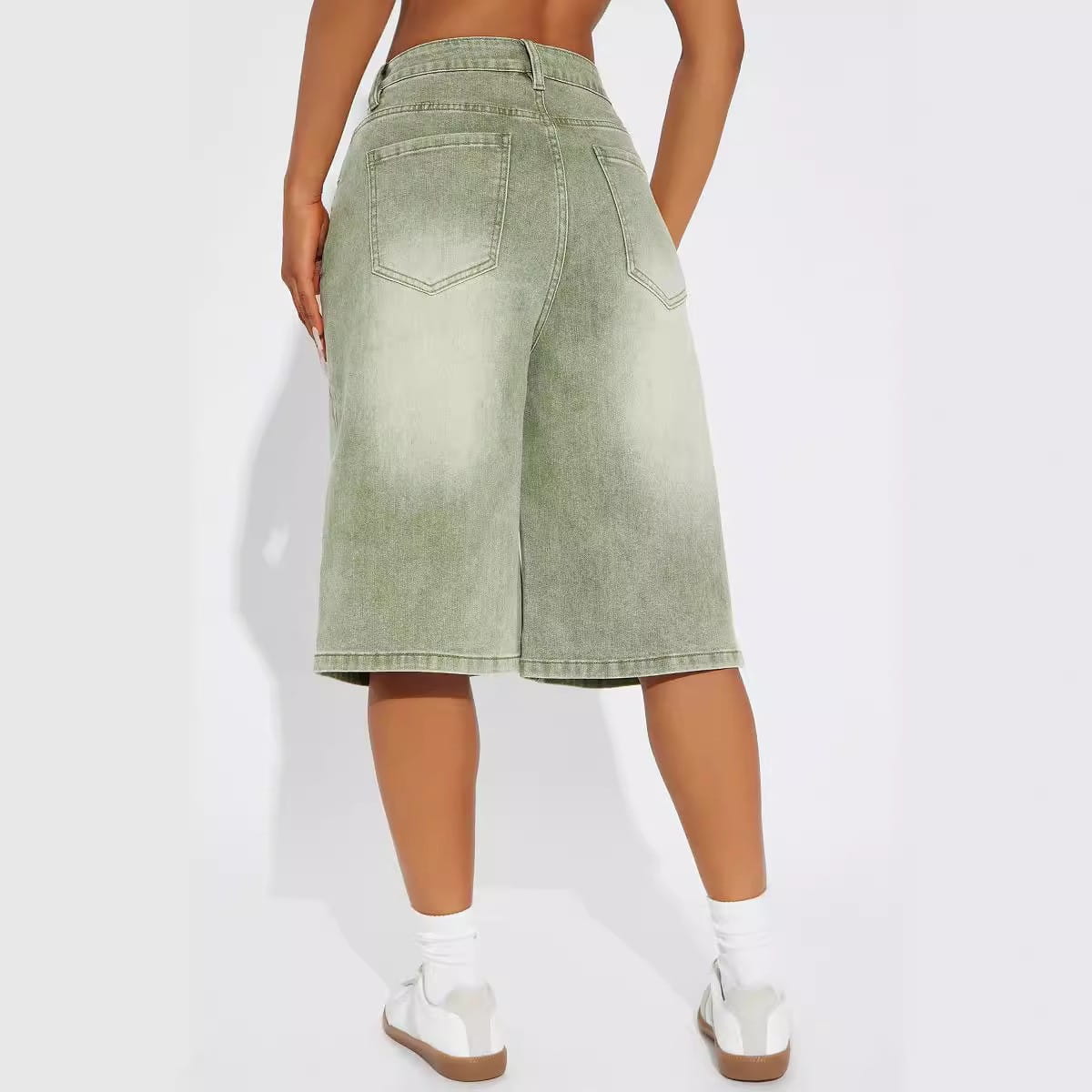 high waisted faded green denim culottes featuring classic back pockets and a jeans double belt adjustable buckle for a relaxed fit