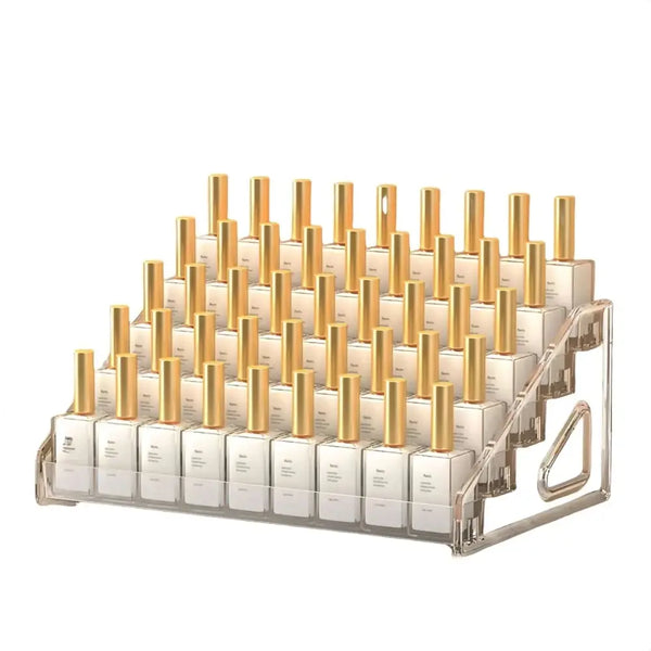 Clear acrylic 5 layer cosmetics storage box displaying multiple gold cap nail polish bottles for makeup accessories organization