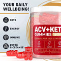A clear jar of vibrant red bear-shaped soft candy gummies labeled acv ketone 1500mg with 60 count gummies