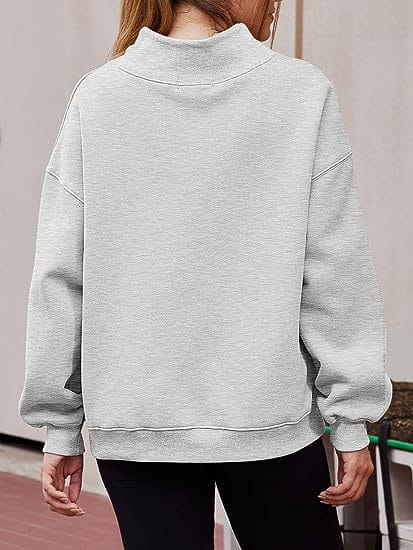 Light gray soft-textured pullover sweatshirt solid with high collar and relaxed fit in solid color design.