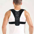 Black mesh-backed adjustable back support belt posture corrector with padded panel for luxury women’s fashion