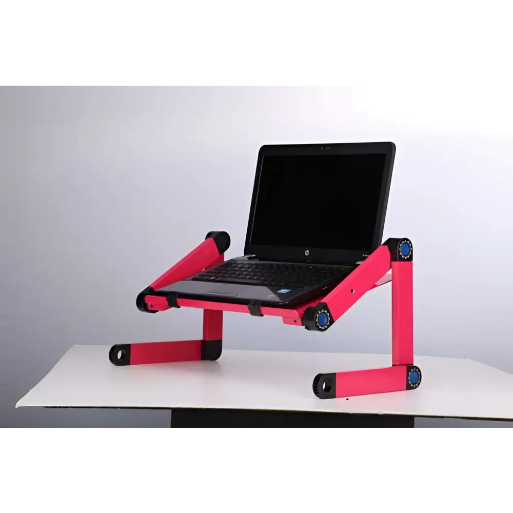 Bright pink adjustable folding ergonomic laptop table stand with black accents and blue joints supporting black hp laptop