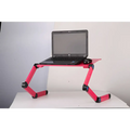 Pink adjustable folding ergonomic laptop table stand with black joints and blue accents for comfortable use