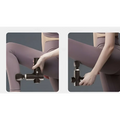Black adjustable handheld muscle massage gun with textured grip and metallic accents for fitness recovery use