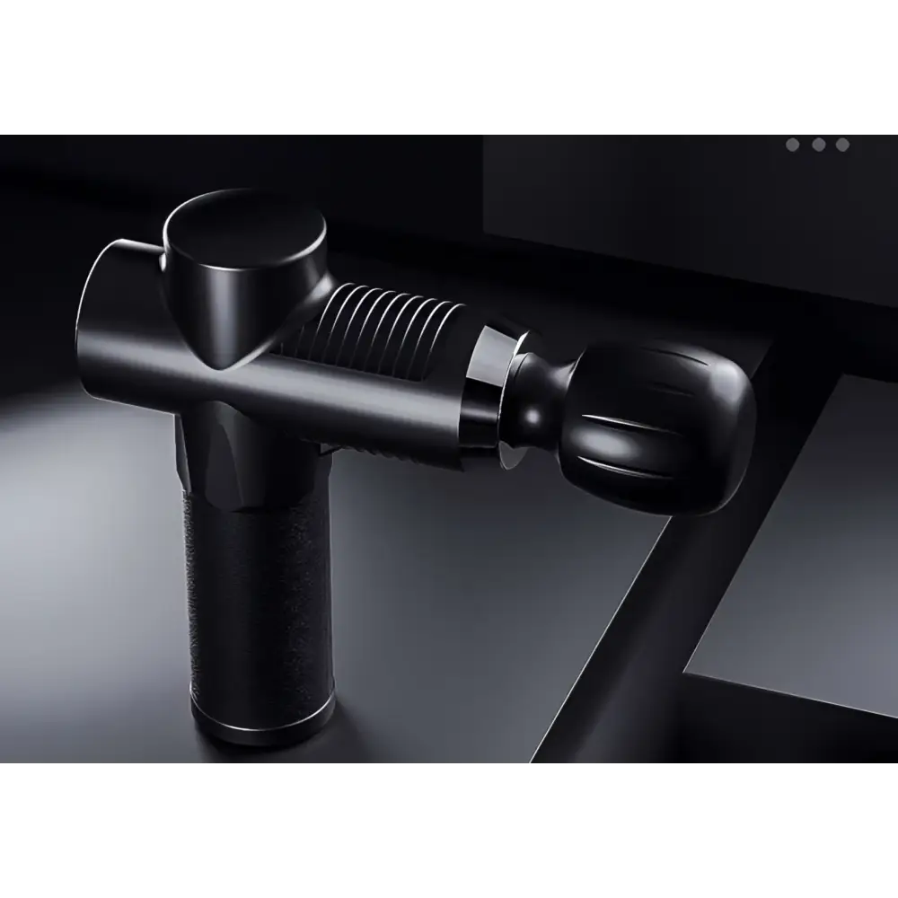 Black adjustable handheld muscle massage gun with textured grip and ribbed barrel for effective fitness recovery