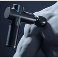 Black adjustable handheld muscle massage gun with textured grip and adjustable head for fitness recovery