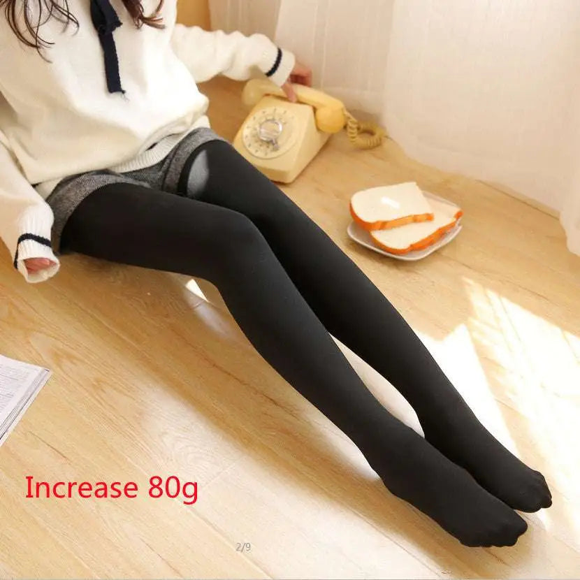 Black opaque adjustable maternity pantyhose tights with smooth seamless texture and subtle ribbed detailing at the top