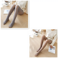 Sheer gray adjustable maternity pantyhose tights paired with a cream-colored sweater for comfortable maternity wear