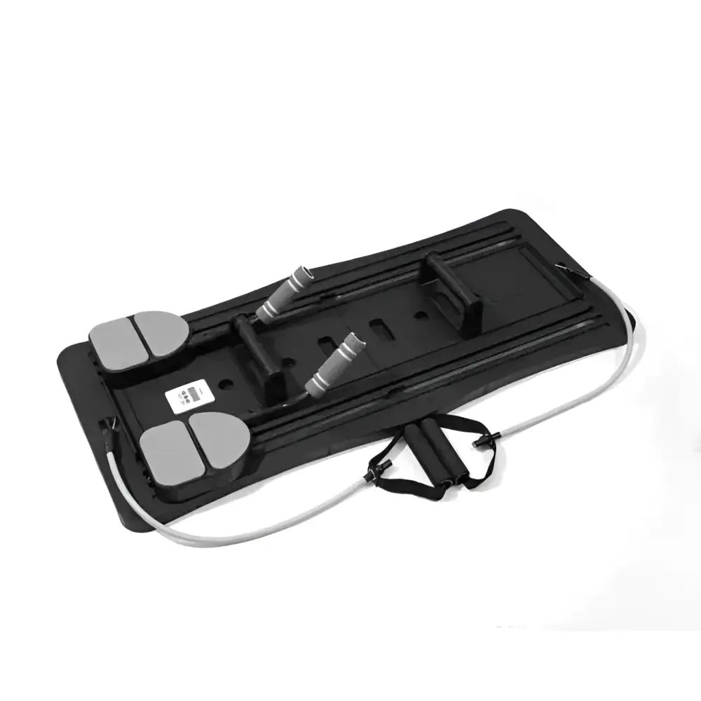 Black plastic adjustable pilates sliding board with gray foot pedals and resistance bands for full-body workouts