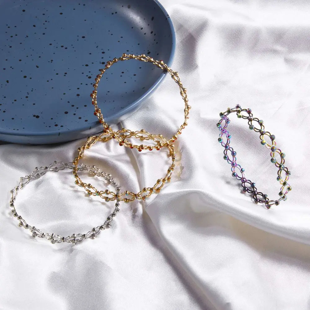 Delicate interlocking chain bangles in gold silver and multicolored metal with bead accents from adjustable rhinestone bracelet and fashion rings set