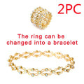 Gold-colored adjustable rhinestone bracelet and fashion rings set featuring multi-layered design and clear crystals