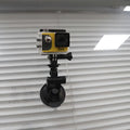 Adjustable yellow and black sports camera suction cup mount securely attaches gopro hero4 for stable recording