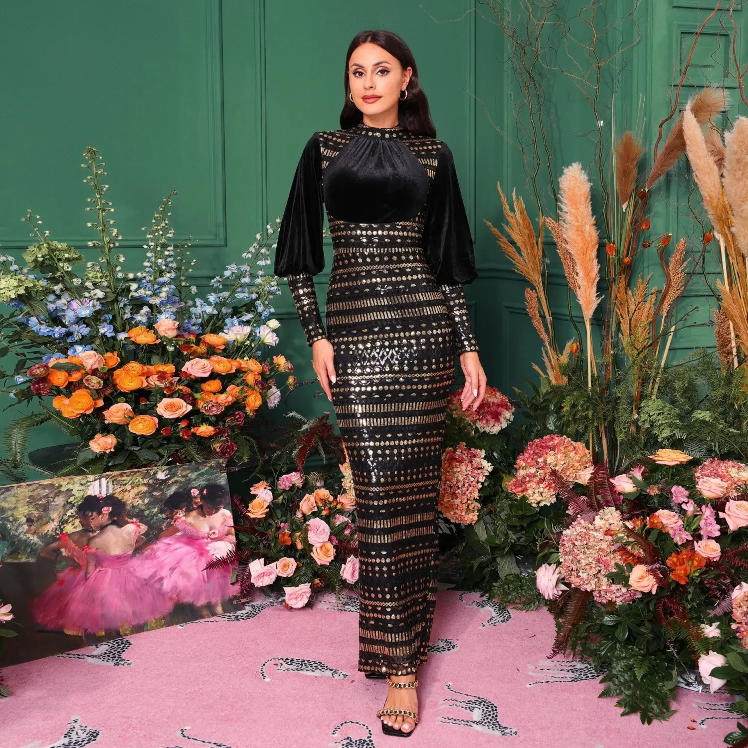 black velvet and sequined midi dress with long sheer sleeves and a long sleeve round neck design